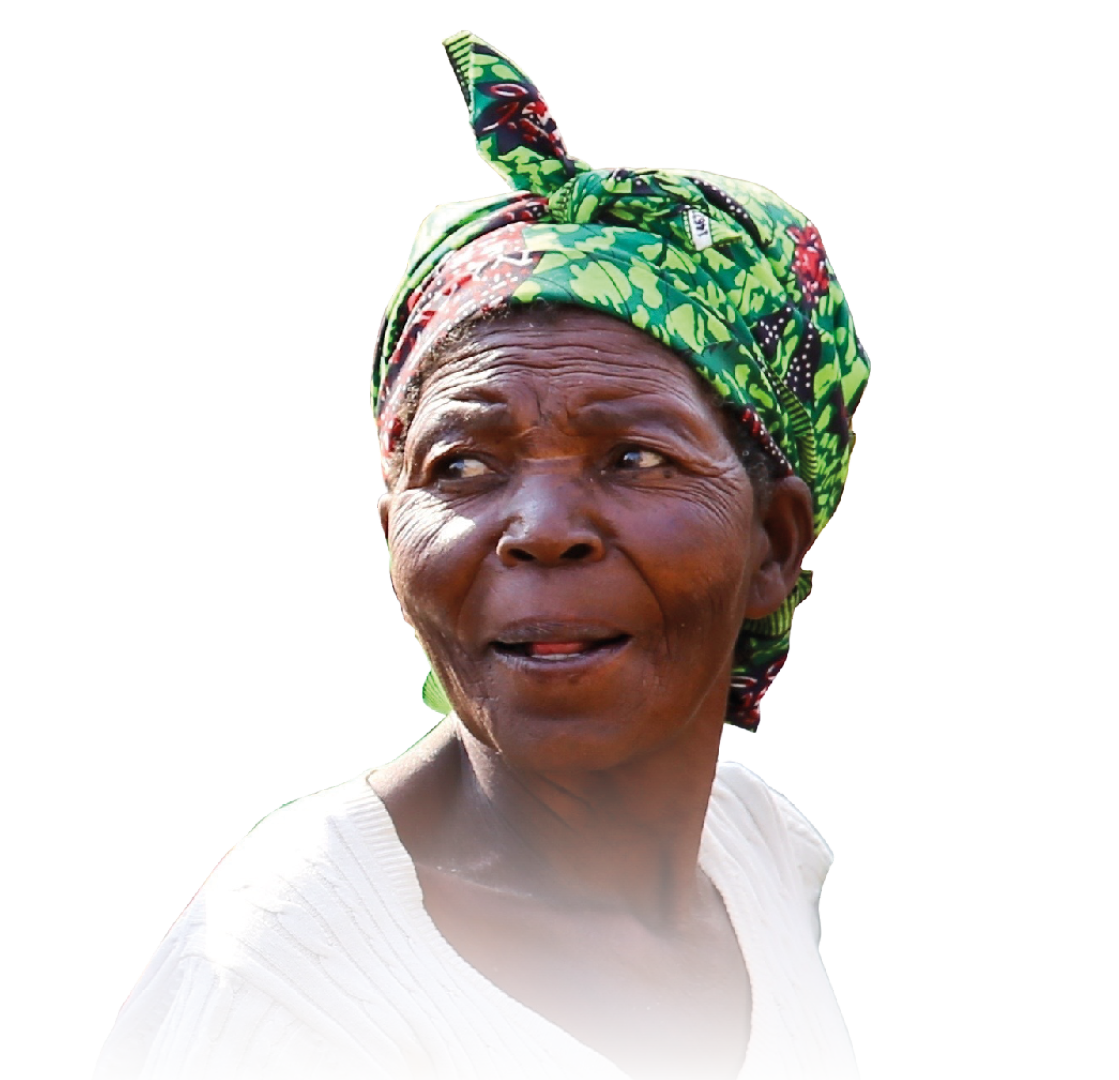 MALAWI, AFRICA, CIRCA SEPTEMBER 2017: A group of colorfully dressed African women and babies gather at a clean water pump